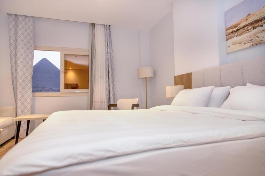 Al Farida Boutique Pyramids Hotel Kafret el-Gabal Buitenkant foto